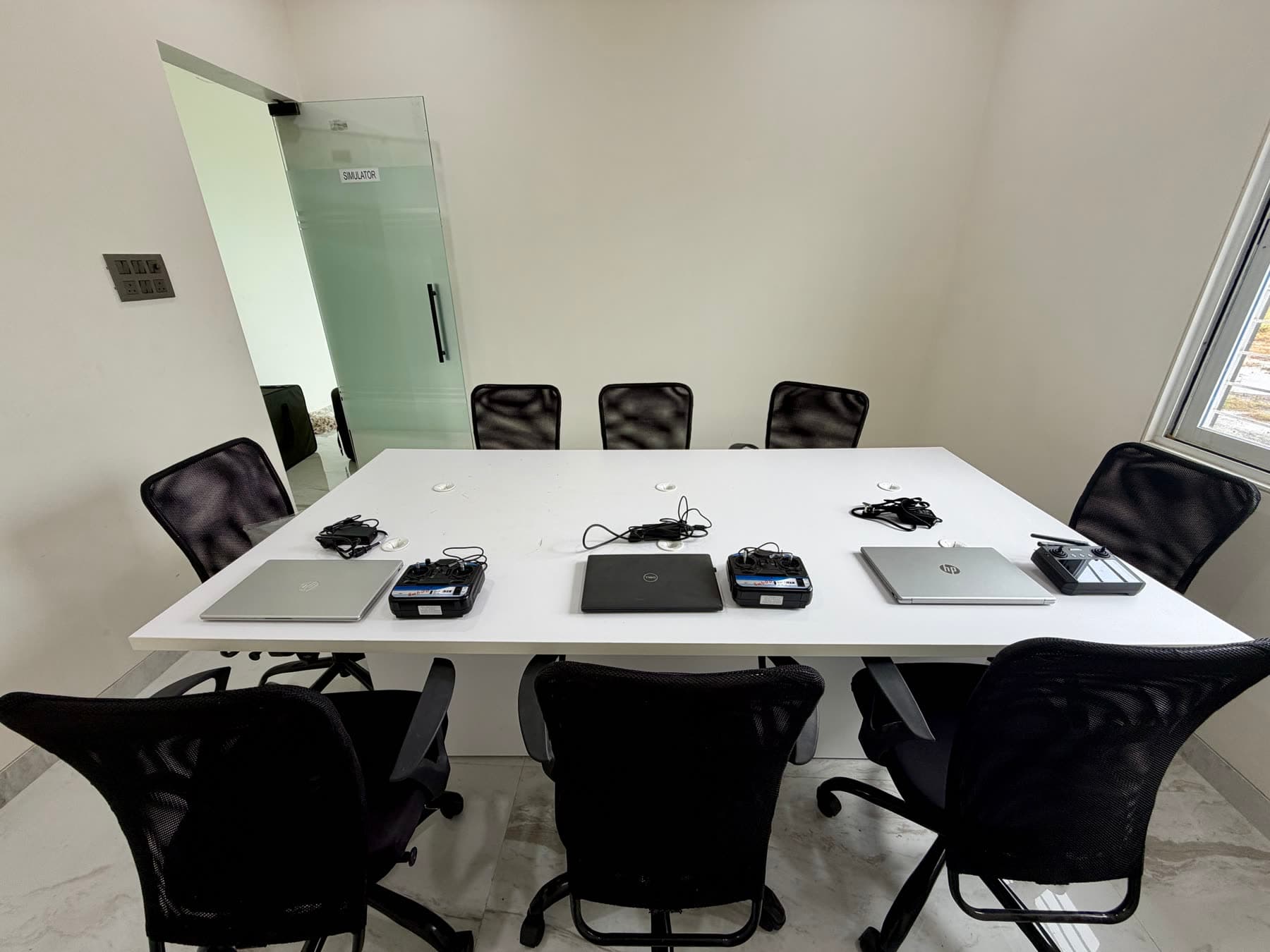 Simulator lab with laptops and radio controllers